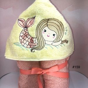 Embroidered hooded towel with Mermaid design.